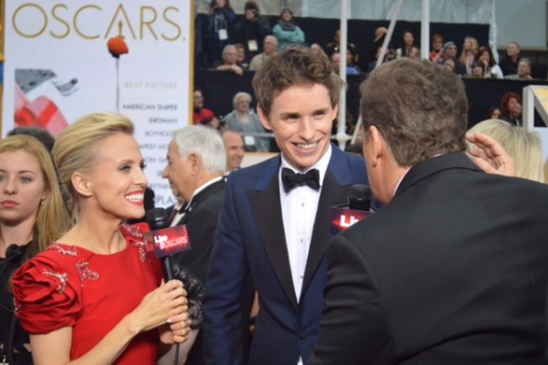 Oscars 2015 and Eddie Redmayne and Jessica Holmes and Sam Rubin and KTLA TV Anchor & TV Host